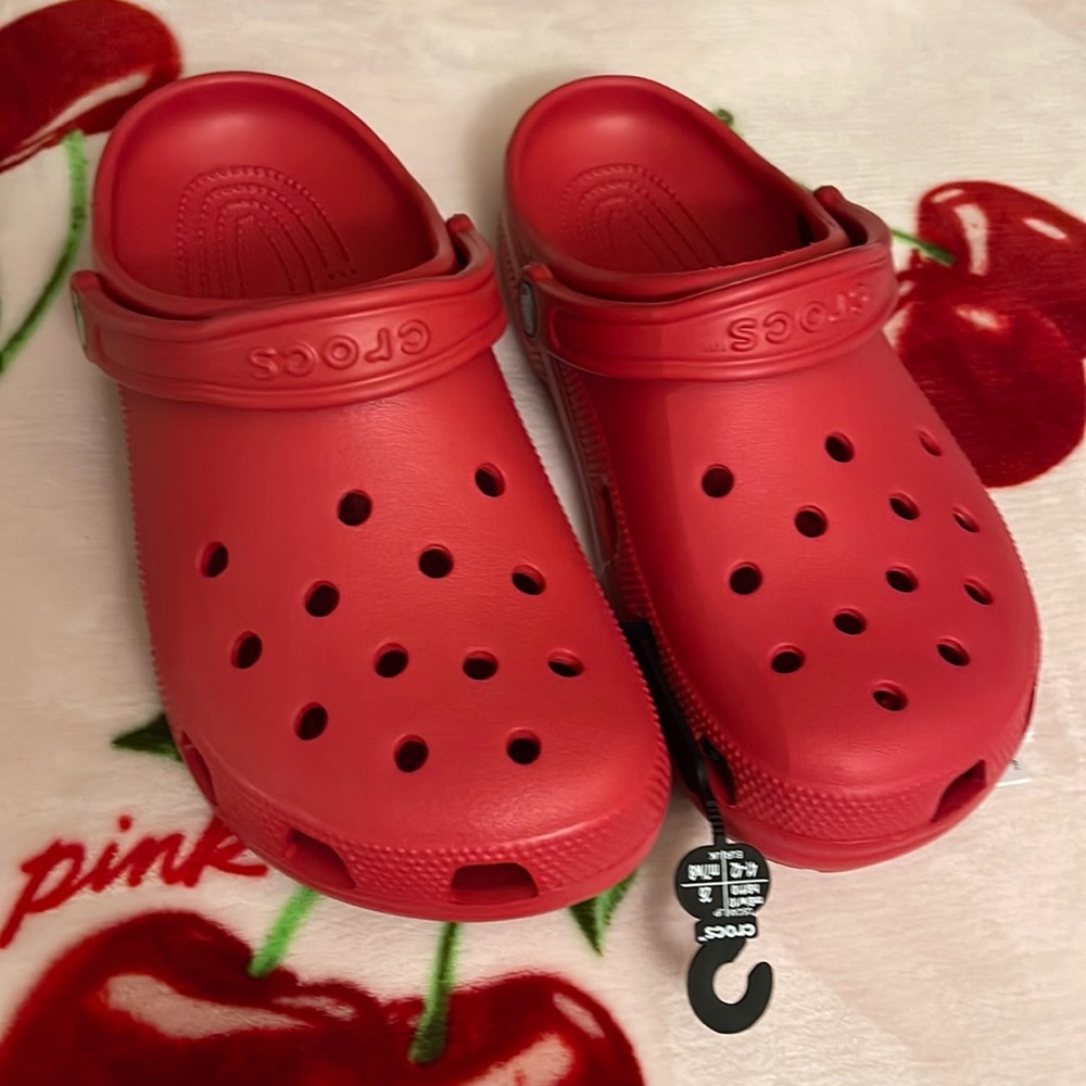 Brand new red crocs